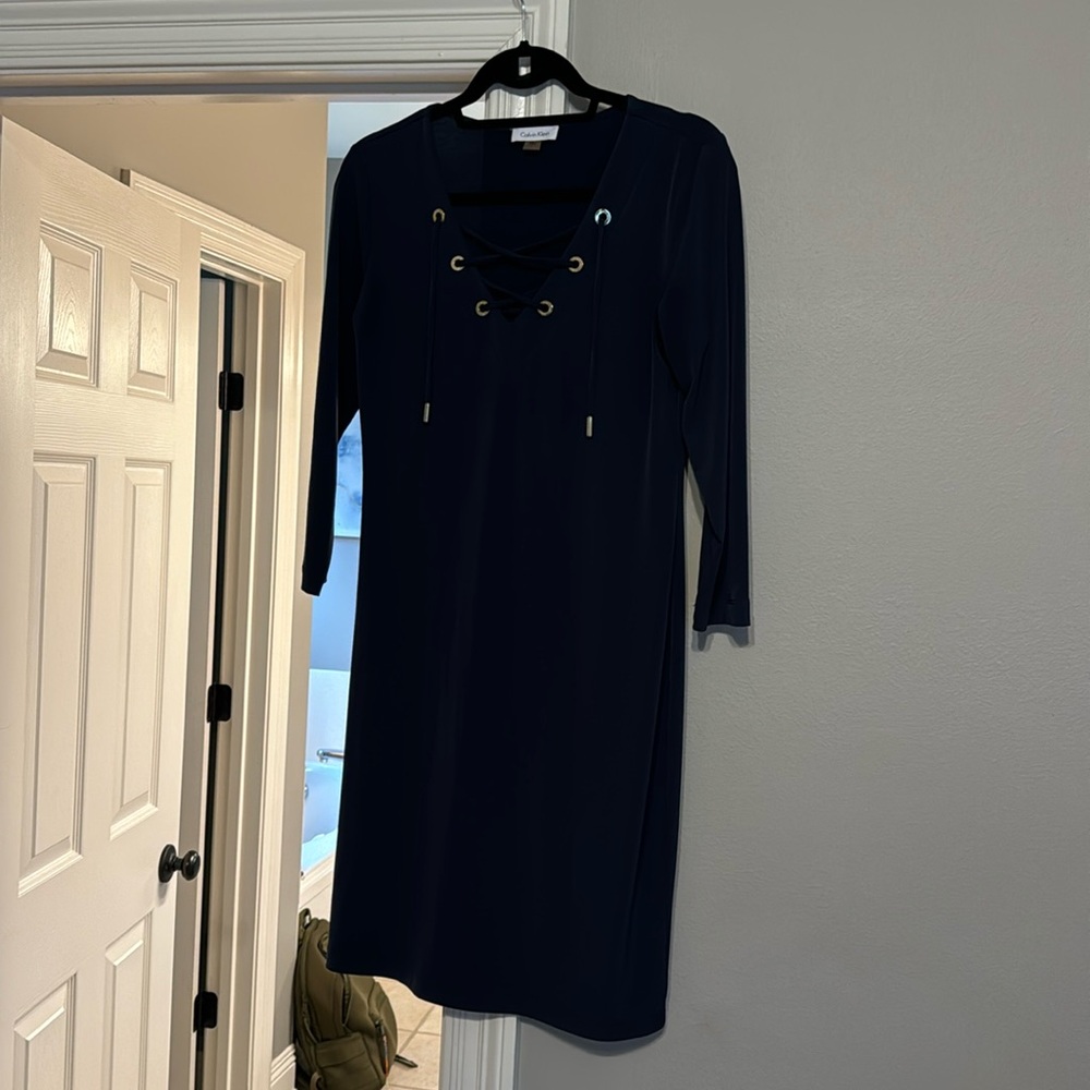 Calvin Klein navy dress with gold neck line design